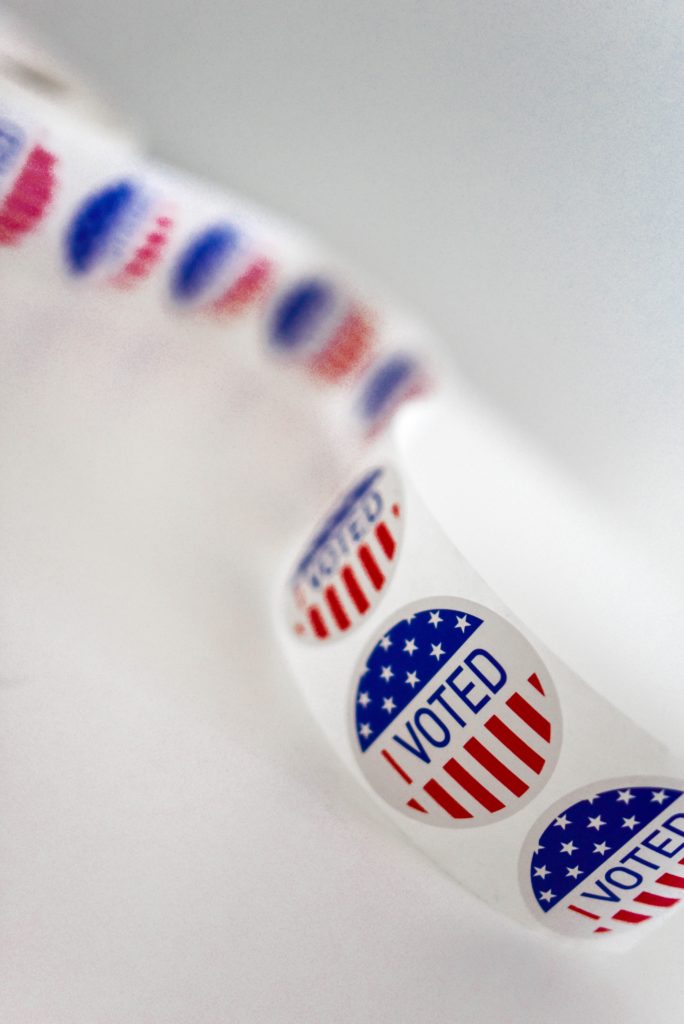 A photo of a roll of American flag "I Voted" stickers