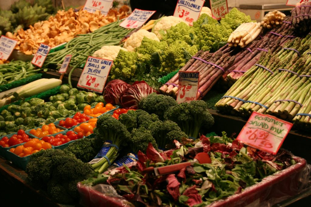 Vegetables in a display case at a market