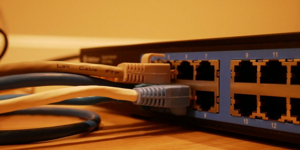 LAN cables running into a wireless router